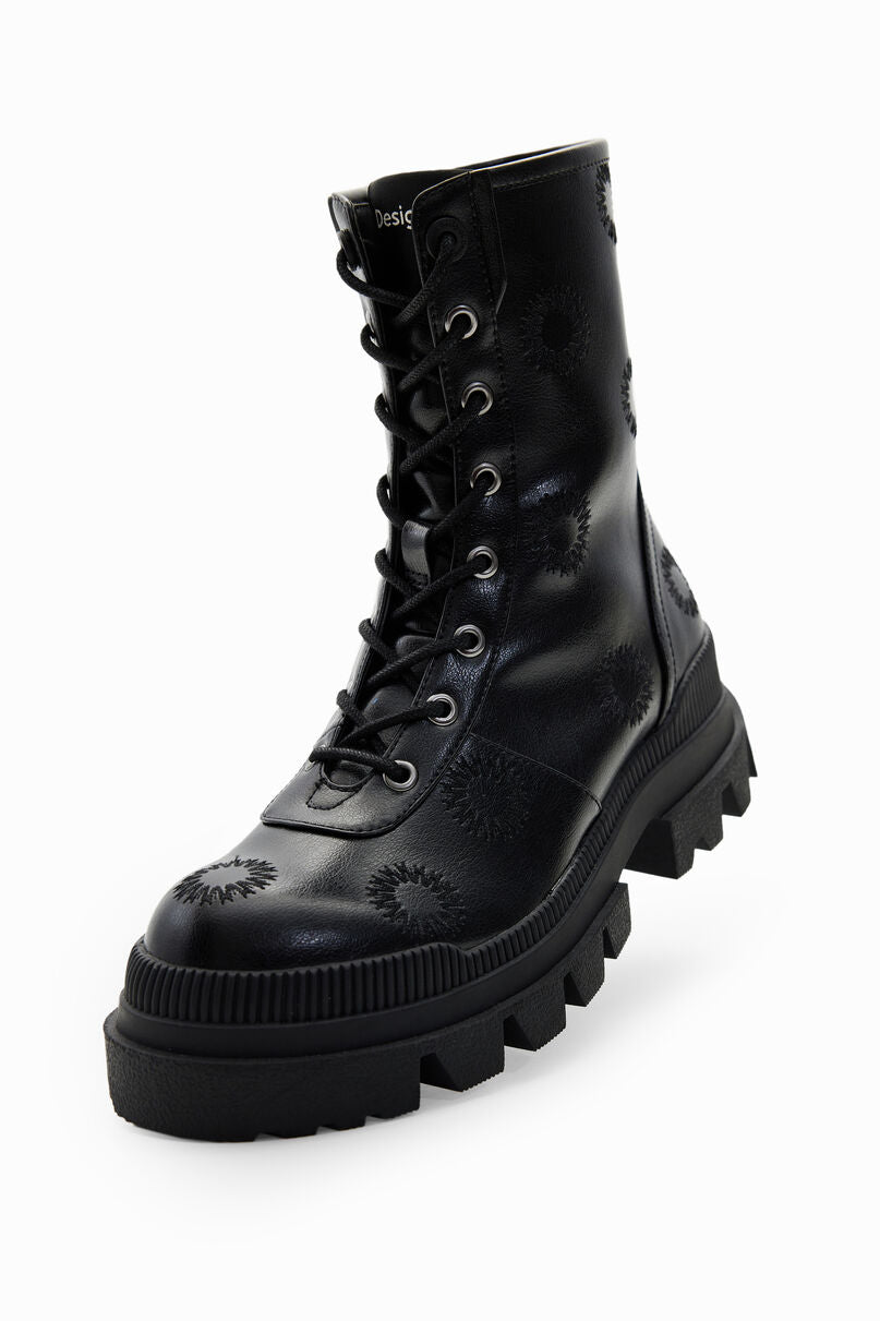 Embroidered track-sole boots